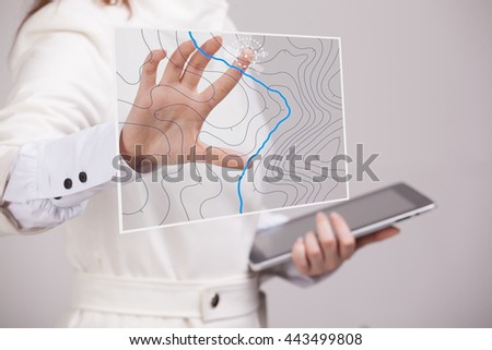 Geographic information systems concept, woman scientist working with futuristic GIS interface on a transparent screen. Royalty-Free Stock Photo #443499808