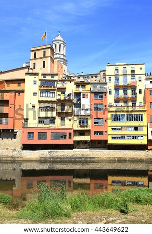 Beautiful colorful buildings in Girona, Spain. The Houses on the River Onyar. Spanish landmark. Urban landscape. Summer time in Spain