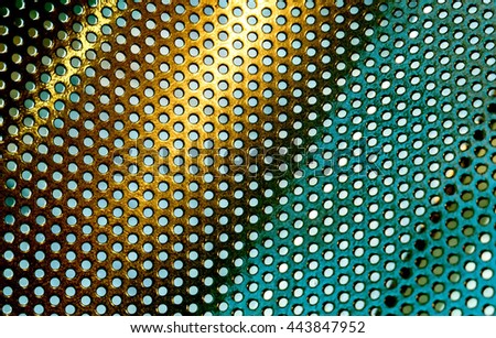 Abstract background: Colorful perforated bent metal sheet grid green and gold color