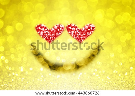 Abstract yellow emoji emoticon smiley face background with sparkle heart eyes for love