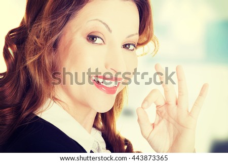 Business woman with perfect gesture
