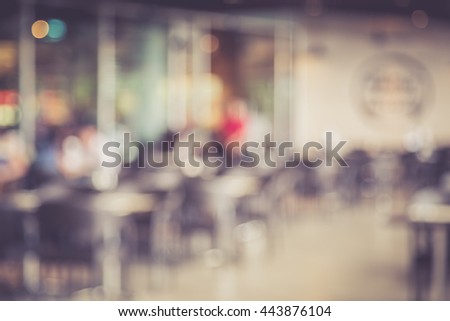 Abstract blurred image of people in coffee shop with bokeh, vintage color