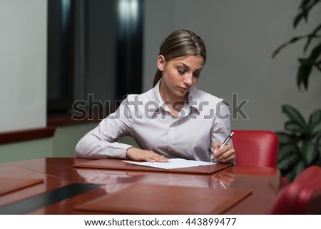 Businesswoman Writing A Letter - Notes Or Correspondence Or Signing A Document Or Agreement