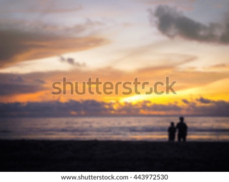 Defocused of Silhouette two people in love at sunset on the beach , Phuket , Thailand
( blur for background )