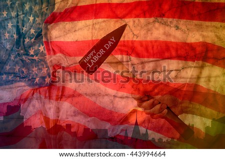 Hand holding hammer with usa flag background,design for labor day concept.