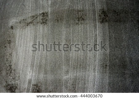 black slate chalk stains . chalky stains school board texture . dark background bright chalk