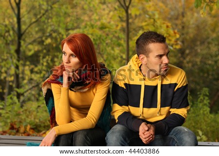 Young pair quarrel in park Royalty-Free Stock Photo #44403886