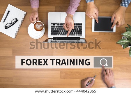 FOREX TRAINING man touch bar search and Two Businessman working at office desk and using a digital touch screen tablet and use computer, top view