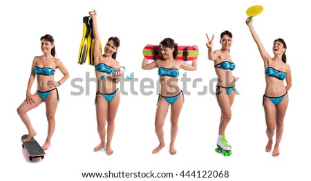Woman in blue bikini playing sports
