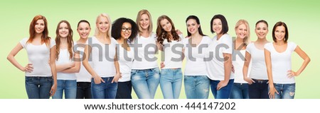 friendship, diversity, body positive and people concept - group of happy women of different age size and ethnicity in white t-shirts hugging over green natural background