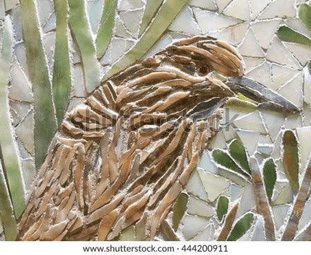 Colorful stone mosaic bird.