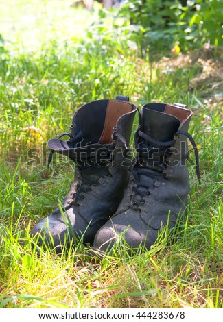dirty hiking (military) boots in the photo