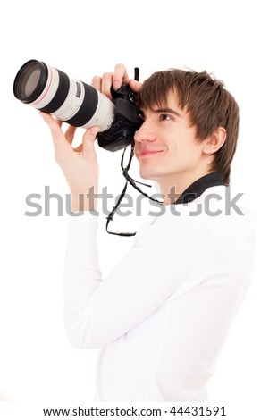 Photographer in white holding phone camera. Isolated over white