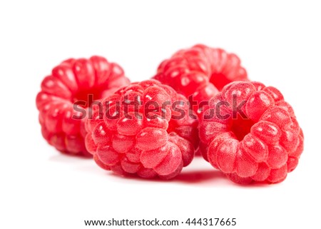 ripe raspberries on white background. Red juicy berries closeup. Stock photos.