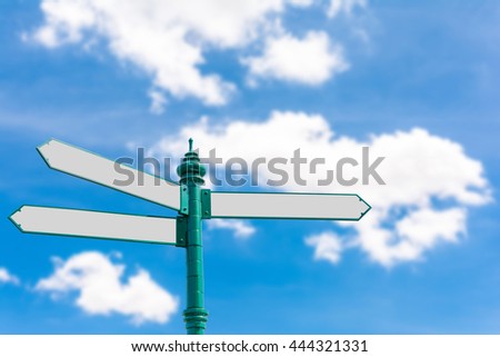 Blank Road Sign on Blurry Blue Sky And White Clouds Background with Clipping Path