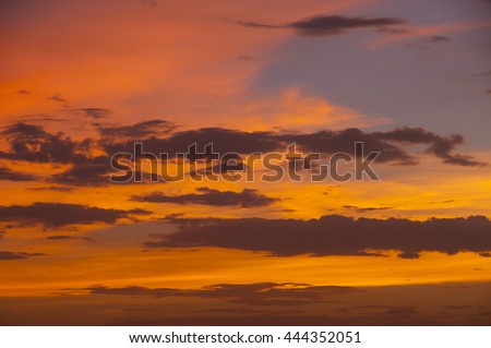 Colorful sky and clouds at Sunset, background of dramatically dark storm clouds. Colorful Sky with dark grey cloud before rain.
