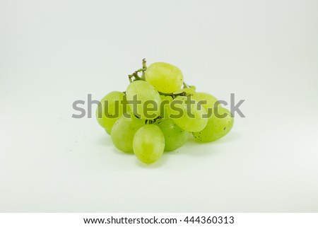 Green grapes on a white background 