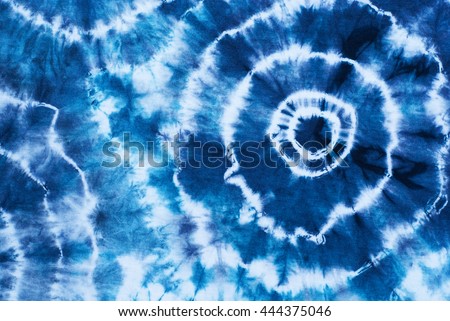 indigo tie dye pattern on cotton fabric abstract background.
