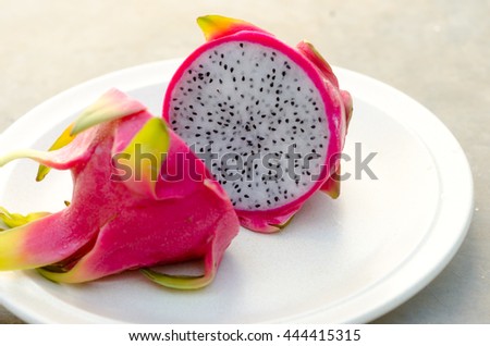 Close-up photo of dragon fruit (pitahaya) on a plate.