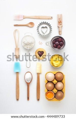 Baking utensil and baking ingredient on clean white background. Flay lay overhead view image. Modern design bakery poster wallpaper. Royalty-Free Stock Photo #444489733