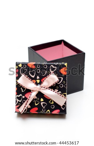 hand-made opened black gift box in white background
