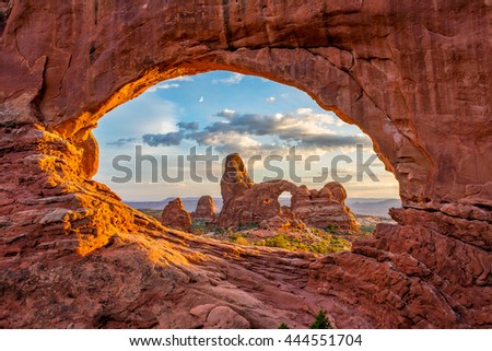 Turret arch through the North Window at Arches National Park in Utah Royalty-Free Stock Photo #444551704