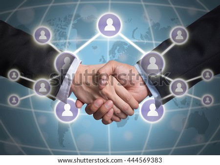 Business handshake with Social media symbol over the world map background, Elements of this image furnished by NASA, Business social netwok concept