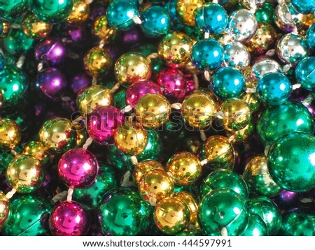Macro photography of mardi gras beads gathered along different parades!