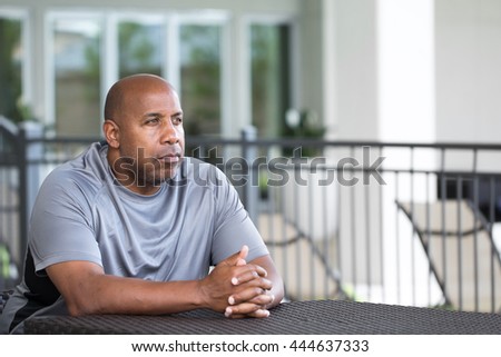 African American man in deep thought Royalty-Free Stock Photo #444637333