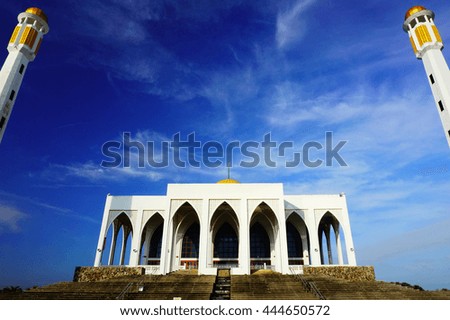 mosque on blue sky background,select focus with shallow depth of field.