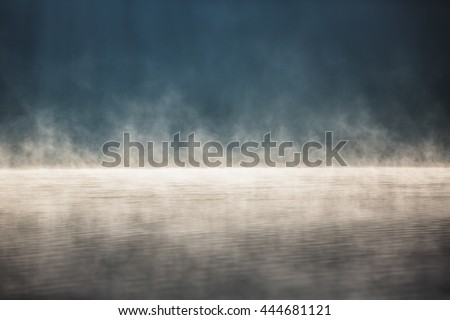 Morning fog on the lake, sunrise shot Royalty-Free Stock Photo #444681121