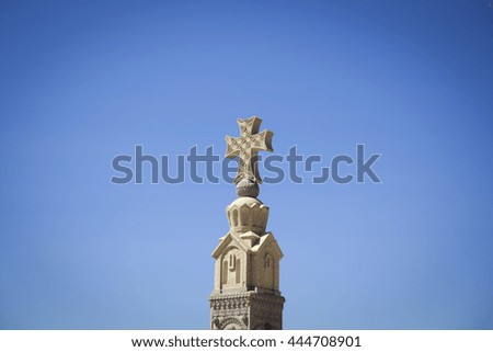 Stone Religious Cross on the top of column