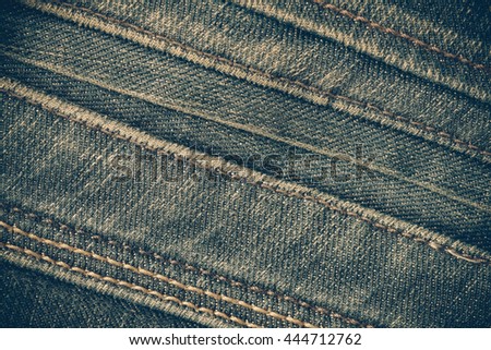 Texture of blue jeans background with filter effect retro vintage style