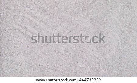 Sand texture. Gray sand. Background of fine sand. Sand background.
 Close up view of a sandy background.