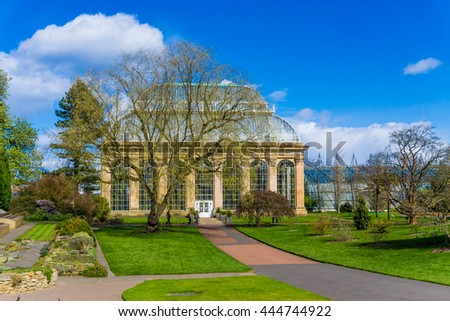 Glasshouse at the Royal Botanical Gardens in public park  Edinburgh, Scotland, UK Royalty-Free Stock Photo #444744922