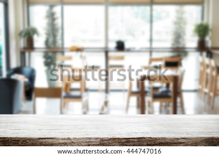 Desk space over restaurant cafe background. Product display montage.
