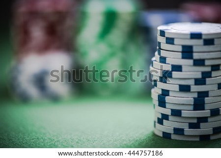 close view on casino chips stack,blurred background