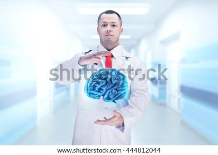 Doctor with stethoscope and brains on the hands in a hospital. High resolution.