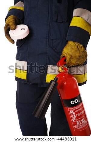 Firefighter holding fire alarm and extinguisher isolated on white