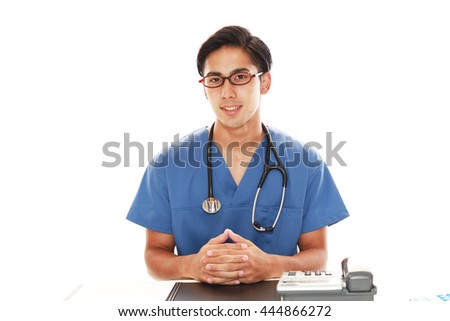 Smiling Asian medical doctor 