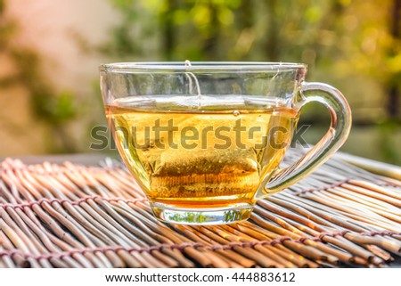 Cup of tea on a blurred background  Royalty-Free Stock Photo #444883612