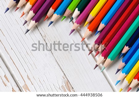 Color pencils isolated on table.Close up.