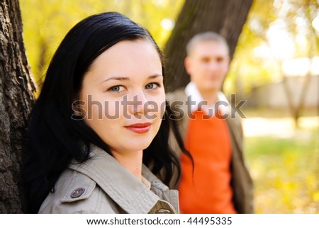 Portrait of young woman with blurry background
