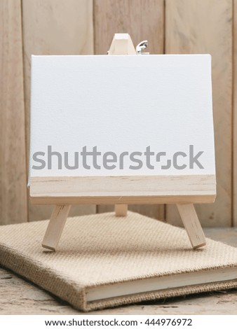Draw painting canvas on a wooden background,with space for text, Concept of education.