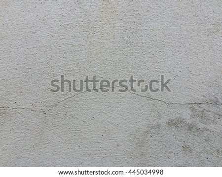 Gray concrete crack wall texture background