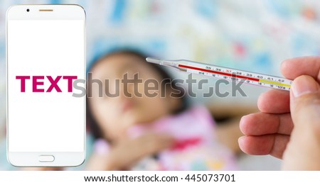 The thermometer, blur image of the  Asian girl are sad as background.