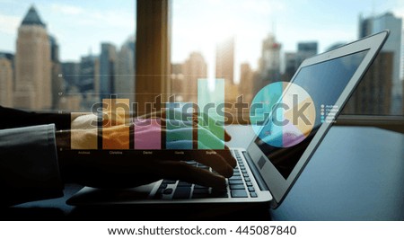 sales person working on laptop desk in modern office building. analyzing financial growth investment strategy. city skyline background  