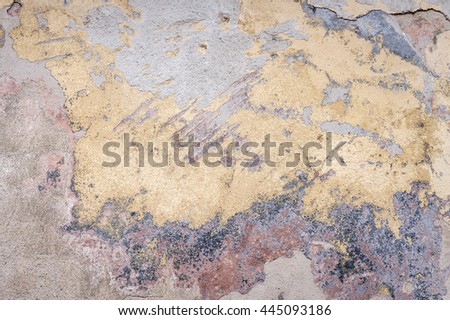 old house wall with cracked plaster