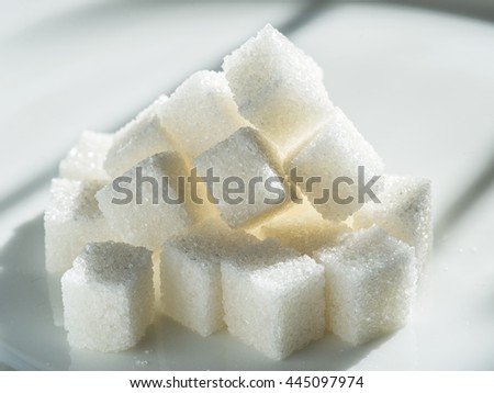 Close up shot of white refinery sugar. Royalty-Free Stock Photo #445097974