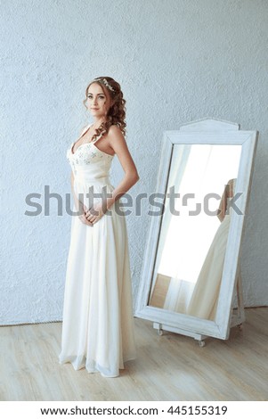 photo of the bride in a studio, wedding, woman, fashion, beauty, white dress.